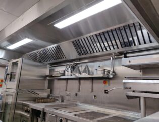 Commercial kitchen canopy and ventilation system installed in a professional London kitchen.